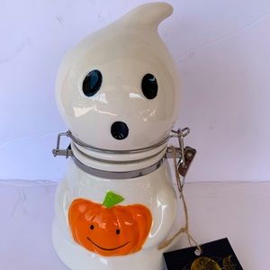 Cute Ghost Holding A Pumpkin.